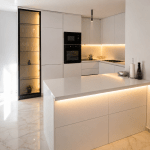 Modern White Kitchen with Illuminated Island Design